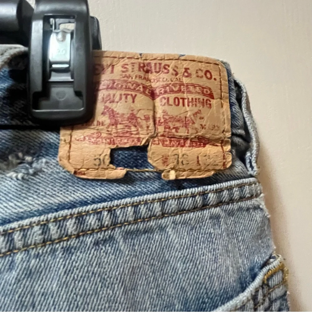 Levi's 505 Regular Fit Blue Straight Jeans with Distressed Details.38x32